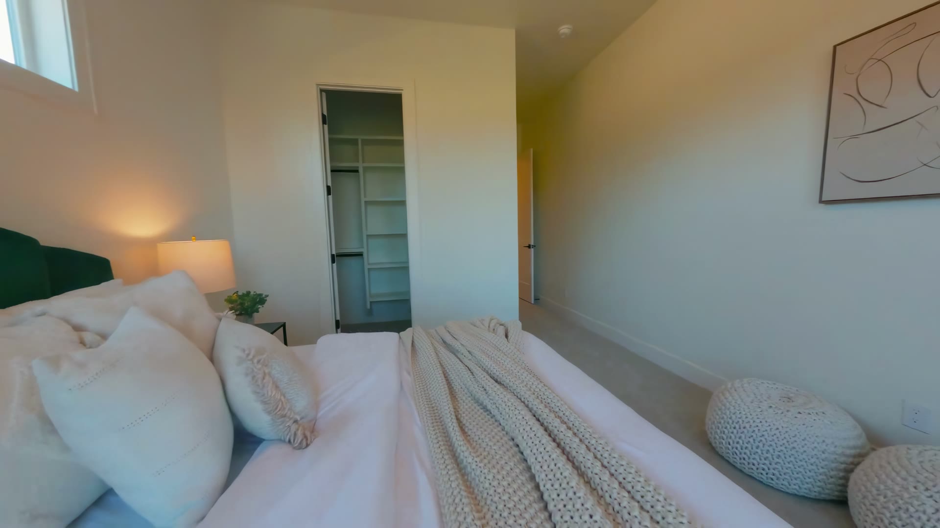 Bedroom with green headboard